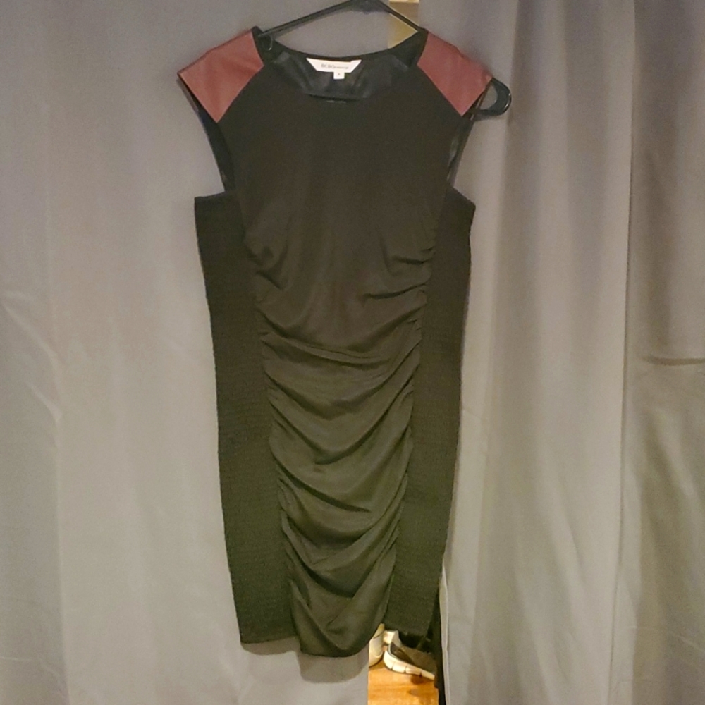 Bold black dress with accent shoulders